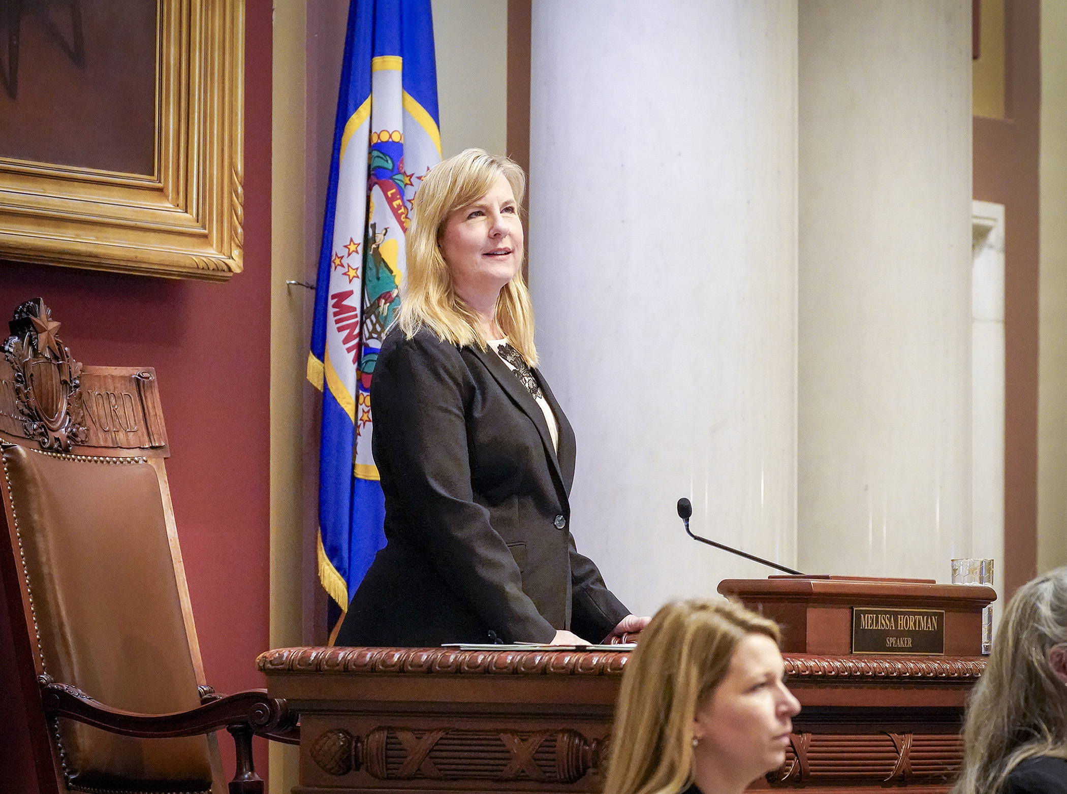 House Speaker Melissa Hortman glances at the House Chamber's gallery as she waits to open the 2024 session Feb. 12. (House Photography file photo)